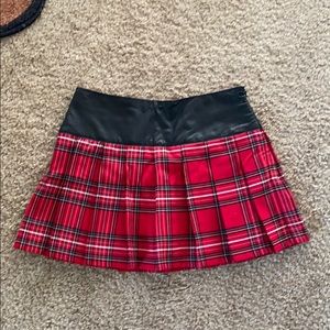 Red plaid mini skirt with built in shorts undernea